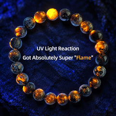 Round flame stone bracelet revealing irregular orange fluorescence under UV light