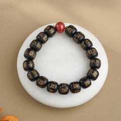 Tibetan Buddhist Blessings: Black Sandalwood Six-Word Mantra Good luck Bracelet - Cerapoet