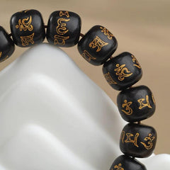 Tibetan Buddhist Blessings: Black Sandalwood Six-Word Mantra Good luck Bracelet - Cerapoet