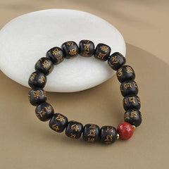 Tibetan Buddhist Blessings: Black Sandalwood Six-Word Mantra Good luck Bracelet - Cerapoet