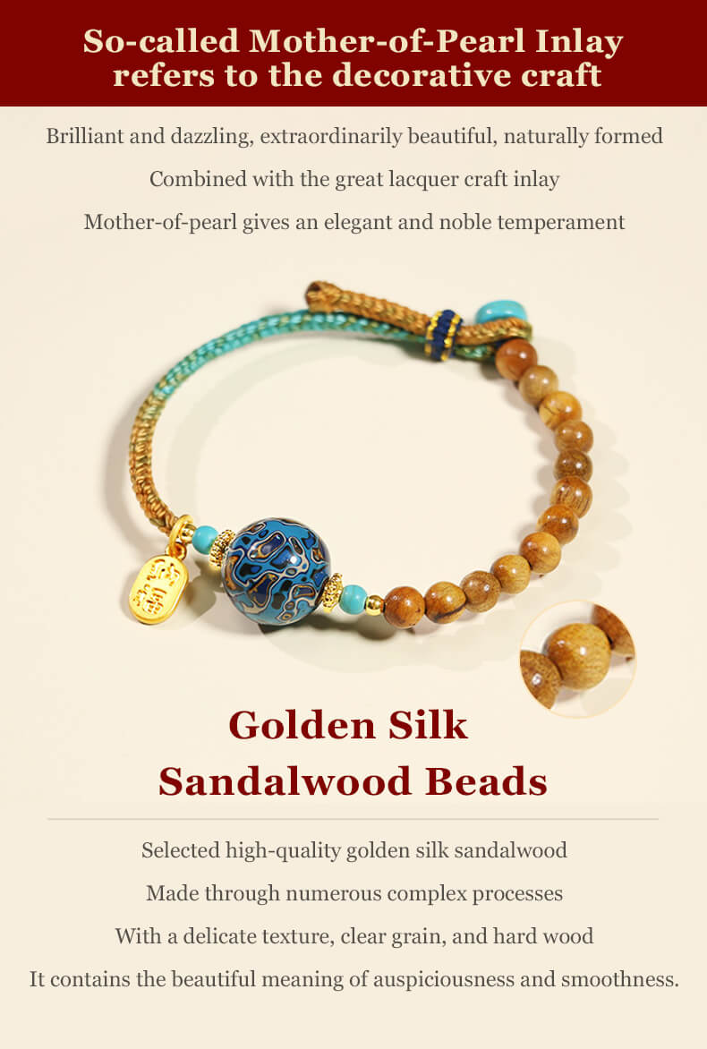 Golden silk sandalwood bead bracelet with a blue decorative orb and gold charm.