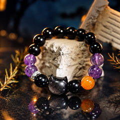 Midnight Familiar obsidian cat bracelet with black obsidian, amethyst and orange yellow agate beads