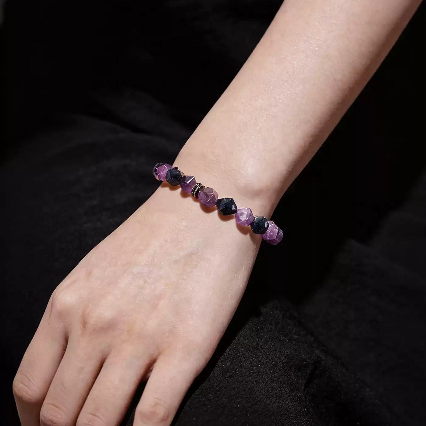 Violet Constellation amethyst and blue goldstone bracelet worn with dark clothing